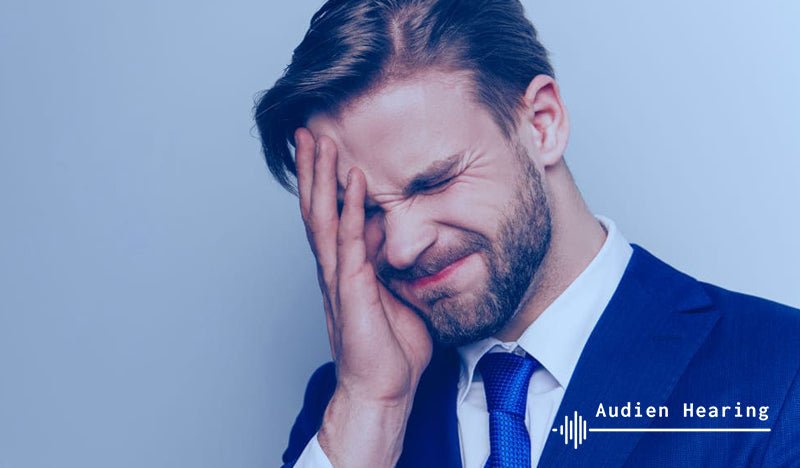 Individual experiencing tinnitus pain
