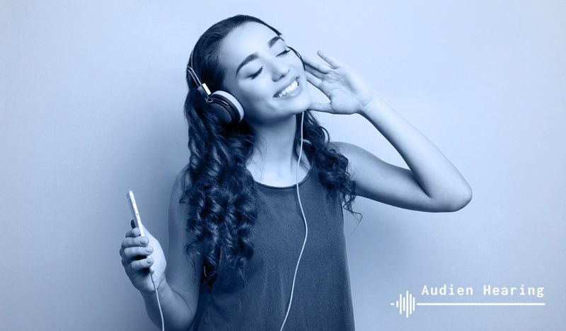 Image of women enjoying the ability to listen to music again